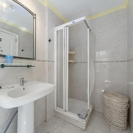With Shared Heated Pool In
