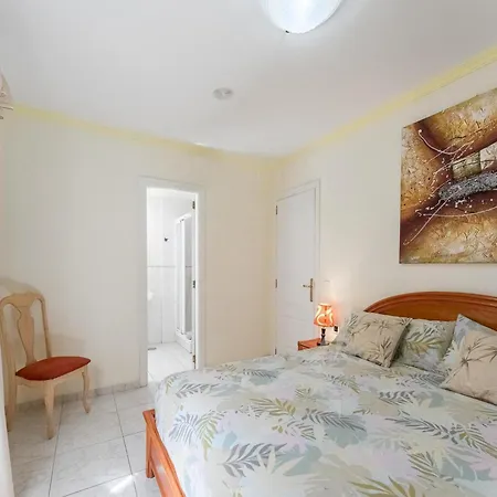 With Shared Heated Pool In