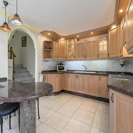 With Shared Heated Pool In